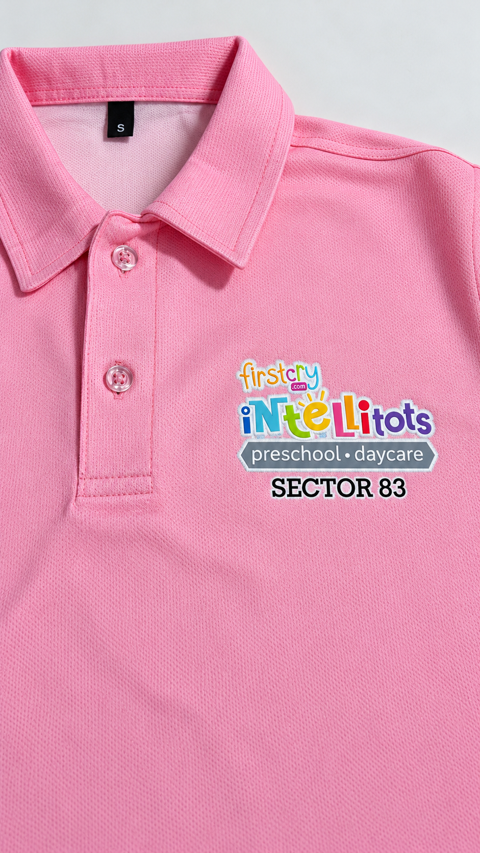 Pink custom staff polo for FirstCry Intellitots Preschool & Daycare