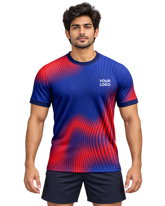 Front model photo of a blue and red ribbed custom sports jersey with plain dark sports shorts