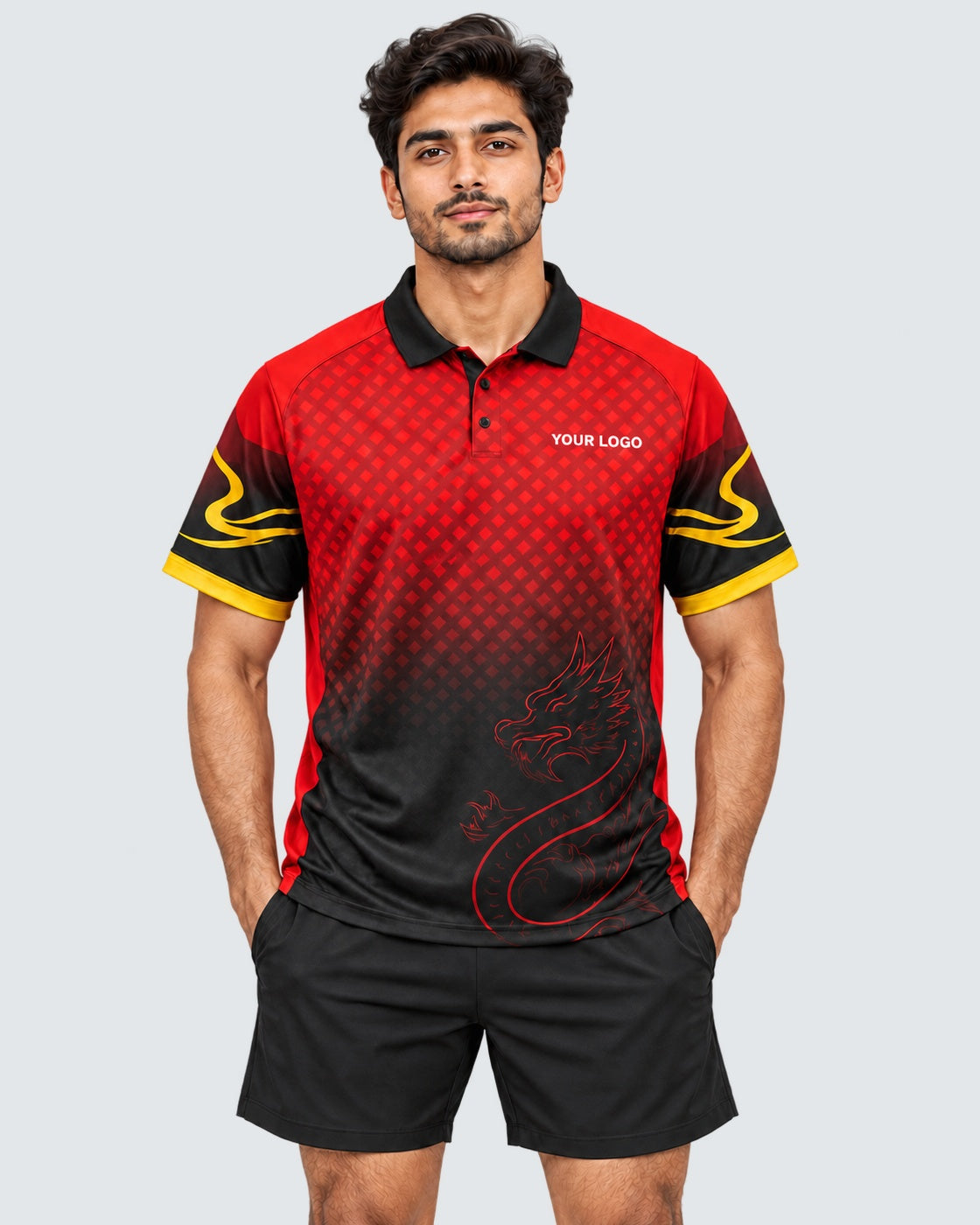 Front model photo of red and black dragon-inspired polo sports jersey with gold sleeve accents, YOUR LOGO chest placeholder, and plain black sports shorts
