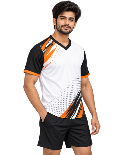 Three-quarter model view of white black and orange V-neck sports jersey and plain black shorts