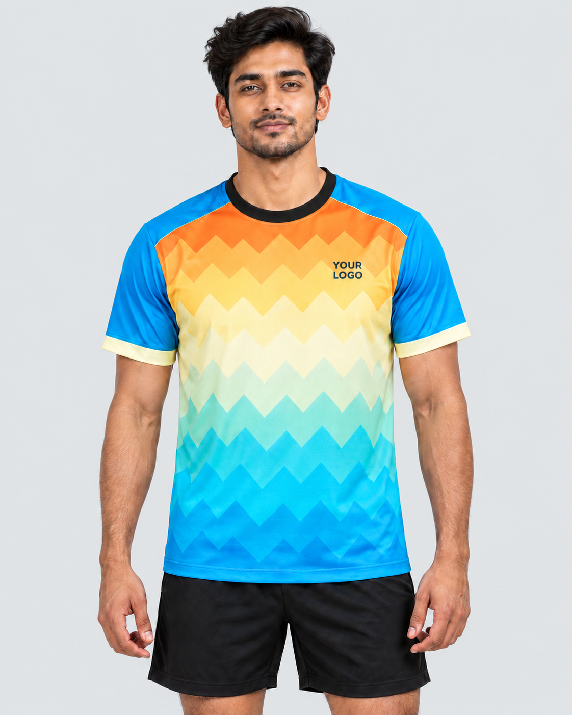 Front view of the orange, golden-yellow, mint, and cyan chevron sports jersey with a black collar, worn with plain black sports shorts