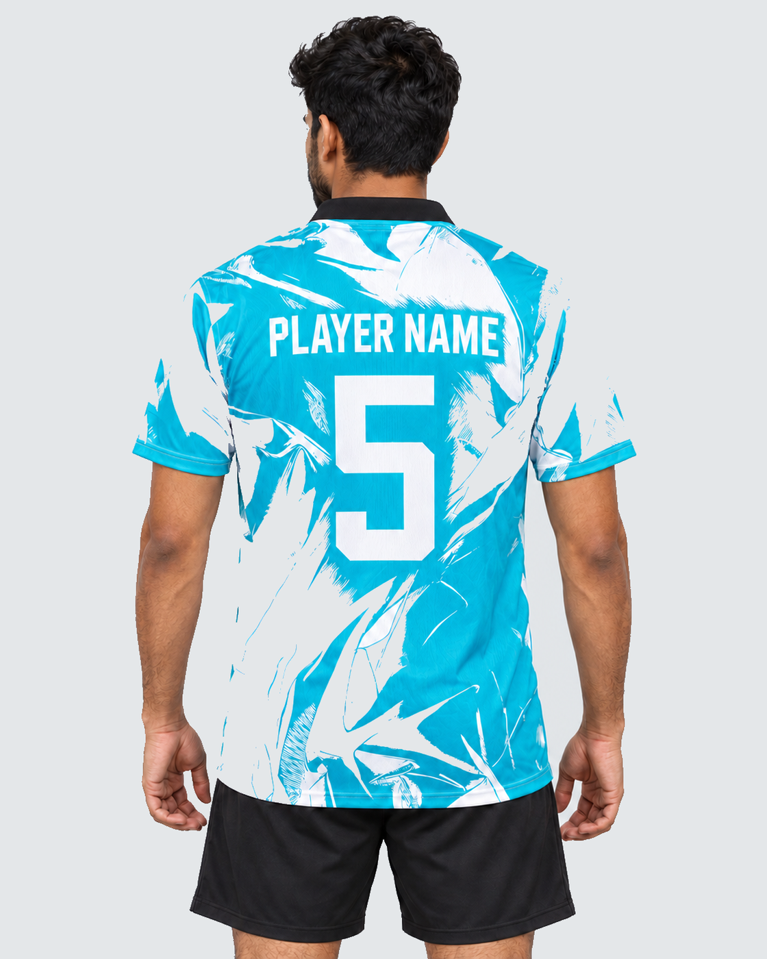Back view of Aqua Brushstroke sports jersey with PLAYER NAME and number 5, black shorts, uniform #E4E7E9 background