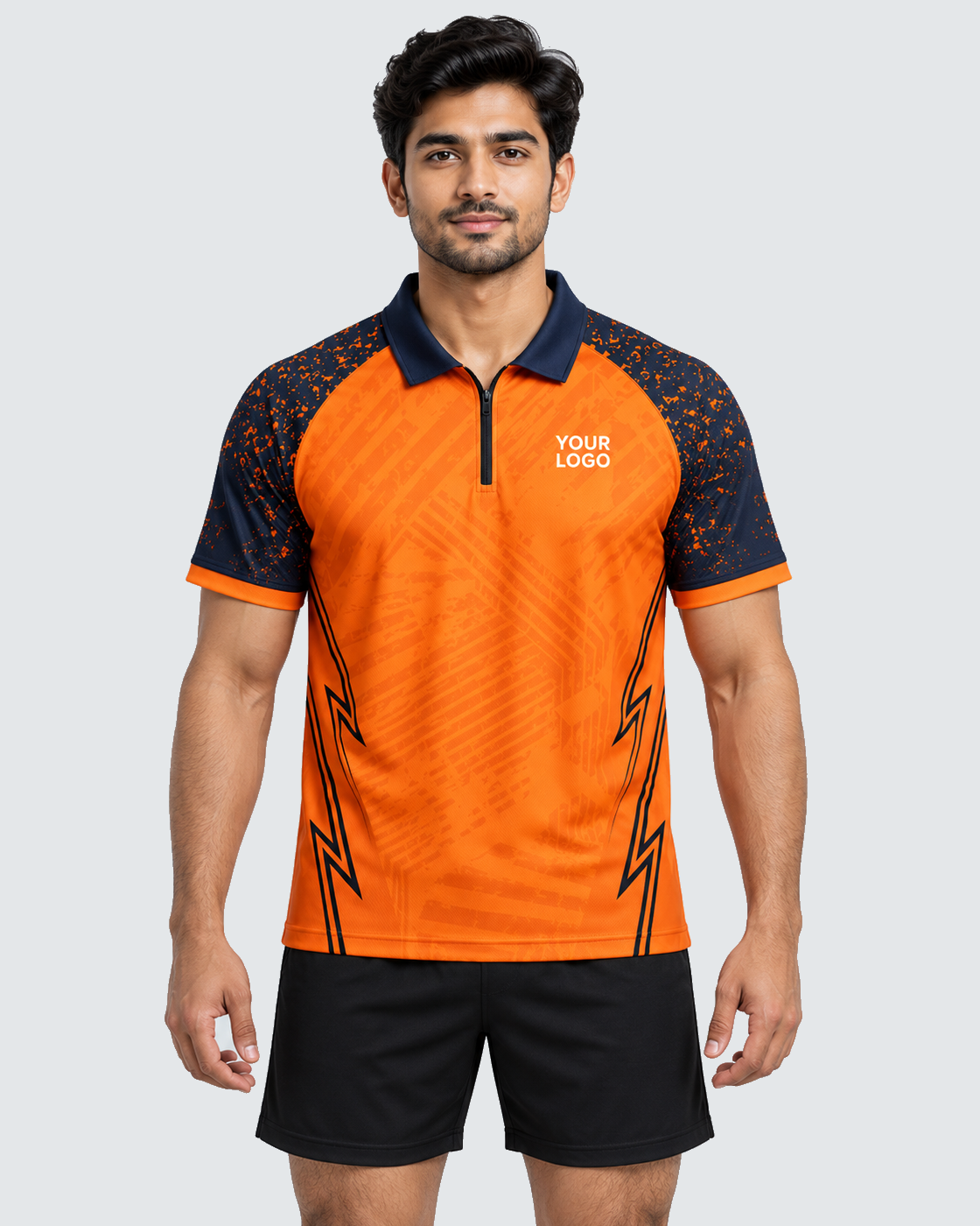 Front model view, orange/navy custom zip-neck sports jersey, exact 4:5, #E4E7E9 background, black shorts