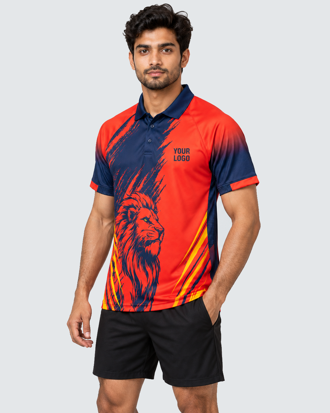 Three-quarter view: red, navy and yellow lion brushstroke sports jersey; black shorts; solid #E4E7E9 background