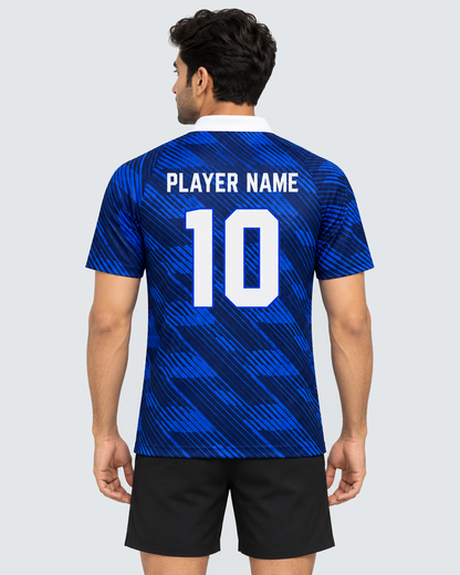 Back 4:5 view of royal blue diagonal brushstroke collared sports jersey with PLAYER NAME and number 10, modeled with plain black shorts on a light grey background