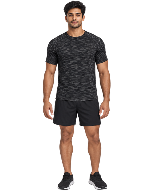Model wearing an unbranded black heather microstripe athletic training tee with black sports shorts