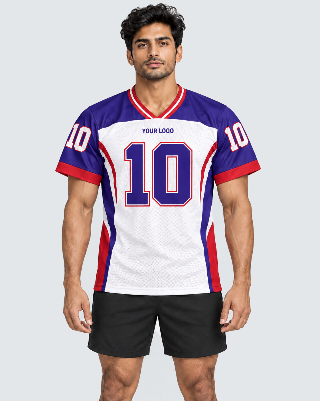Front 4:5 view of white, purple and red custom football jersey with number 10 and YOUR LOGO, worn with plain black shorts on a light grey background