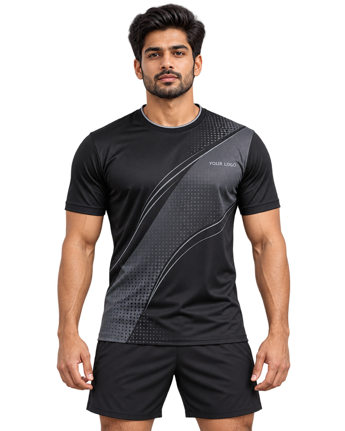 Indian male model wearing the Graphite Arc black and graphite sports jersey with plain black shorts, front view