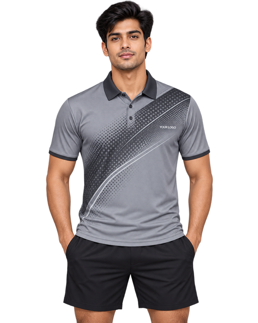 Graphite Vector grey sports polo jersey on an Indian male model wearing plain black sports shorts, front view