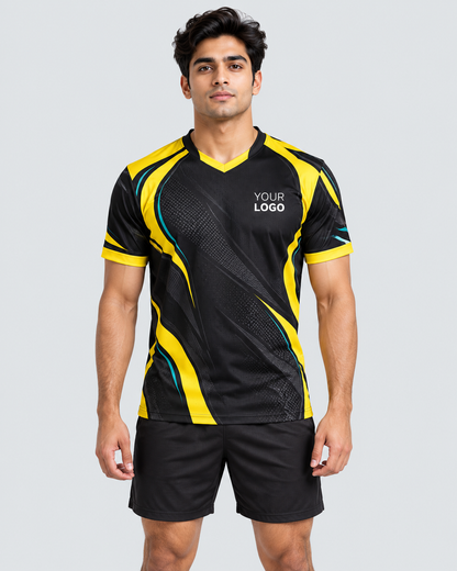 Front view of Indian model wearing the original black, yellow and teal Volt Strike custom V-neck jersey with YOUR LOGO placeholder