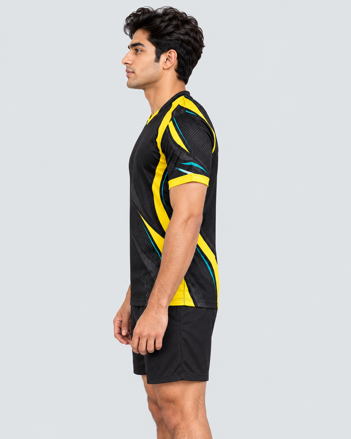 Left side profile of Indian model wearing the Volt Strike jersey