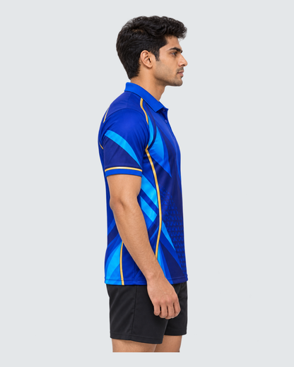 Cobalt Motion, Opposite profile; Indian male model, black sports shorts, solid #E4E7E9 background, portrait 4:5