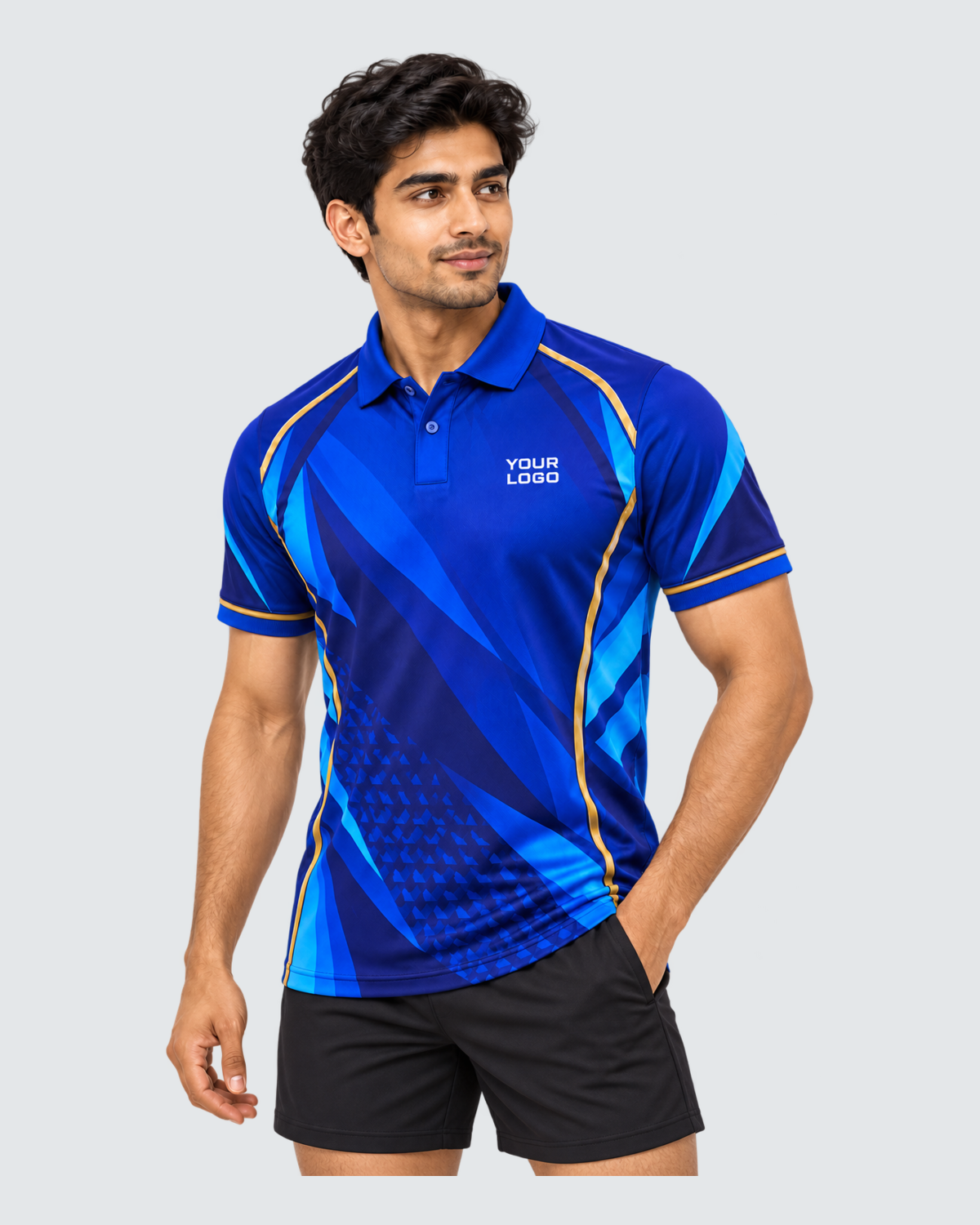 Cobalt Motion, Three-quarter front view; Indian male model, black sports shorts, solid #E4E7E9 background, portrait 4:5