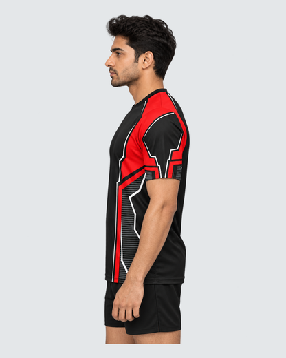 Crimson Frame, Opposite profile; Indian male model, black sports shorts, solid #E4E7E9 background, portrait 4:5