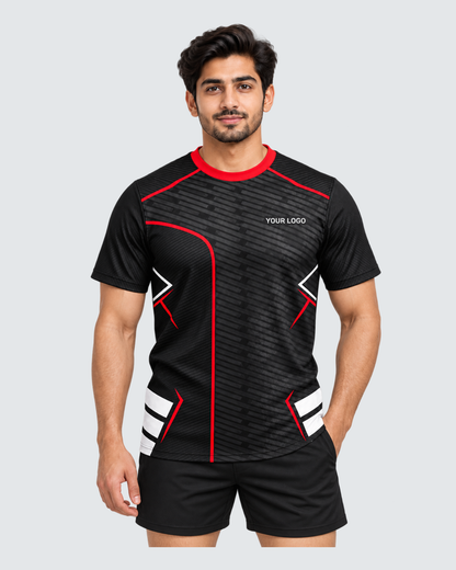 Redline Shadow, Front view with YOUR LOGO chest placement; Indian male model, black sports shorts, solid #E4E7E9 background, portrait 4:5